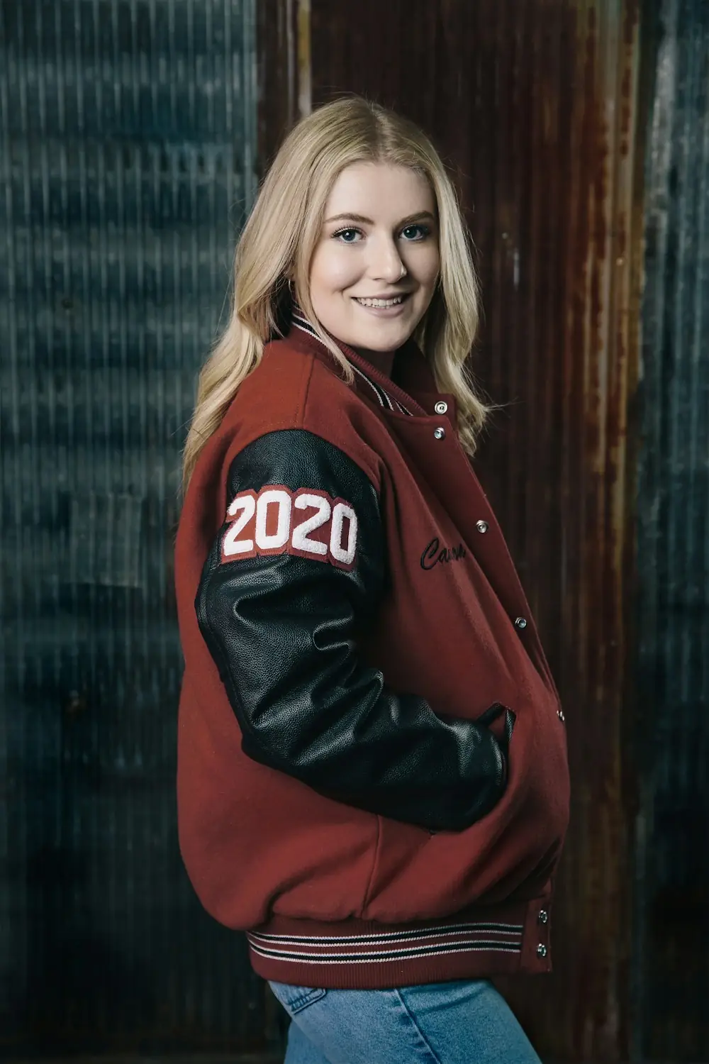 Athlete in a custom varsity jacket