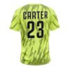 Neon lime green baseball jersey with black splatter graphics back view, number 23 and CARTER lettering.